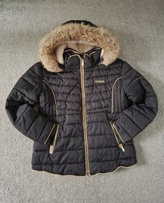Black McKenzie girl's jacket. Size 10 - 12 years