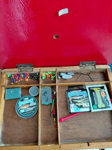 Vintage fishing box with some accessories inside