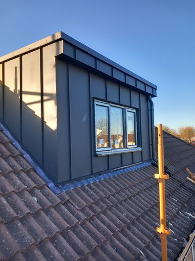 Standing seam roof, sale and delivery of roofing materials and gutter systems