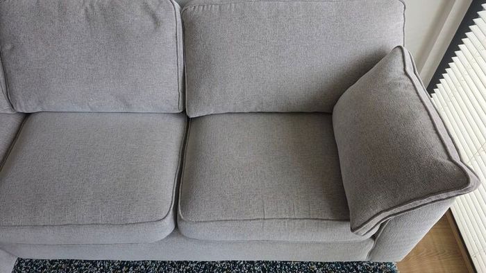 Light grey fabric corner sofa