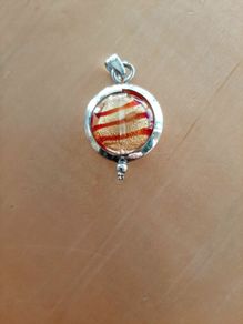 Silver and glass swirl pendant
