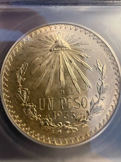 1933 Mexico Un Peso ICG graded MS64
