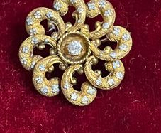 14kt gold pin wheel brooch