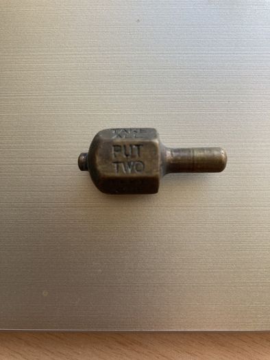 1920s brass Put & Take spinner