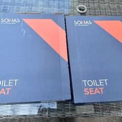 Two Sonas Alpha toilet seats