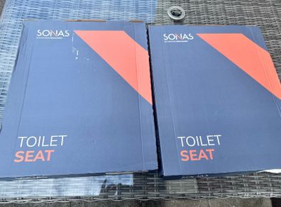 Two Sonas Alpha toilet seats