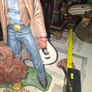 Large Vintage Ceramic Cowboy Figurine Hand Painted brown jacket and a detailed saddle resting at his feet Postage Available or Collection Image 3