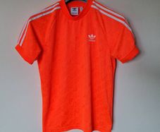 2020 adidas monogram jersey Size small Pit to pit 20" orange in like new condition