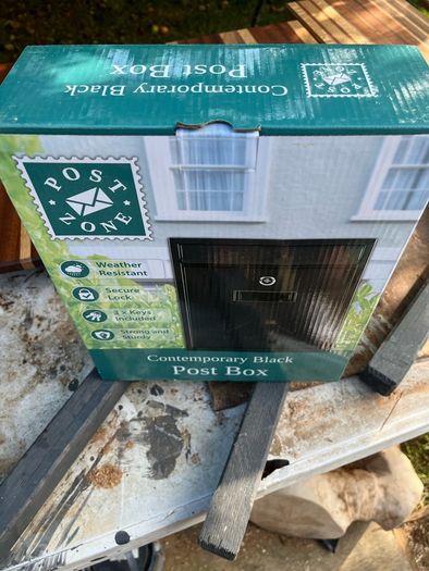 Brand new black letterbox