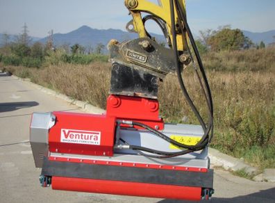Heavy duty mulchers  on demo , see it working .