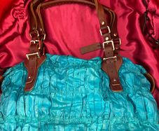 Pauric Sweeney turquoise bag with brown leather detail