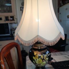 Beautiful Old Large Creamic Table Lamp  Hand Painted Floral Motifs Decorative Chinoiserie Inspired, and a Cream Colored Fabric Shade with Fringed Edging.