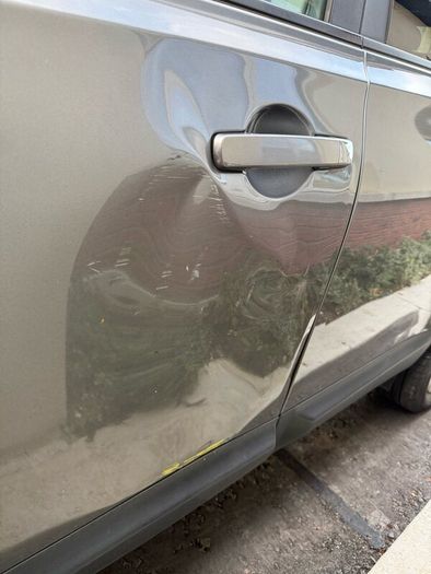 Nissan Qashqai + 2, seven seater, silver grey