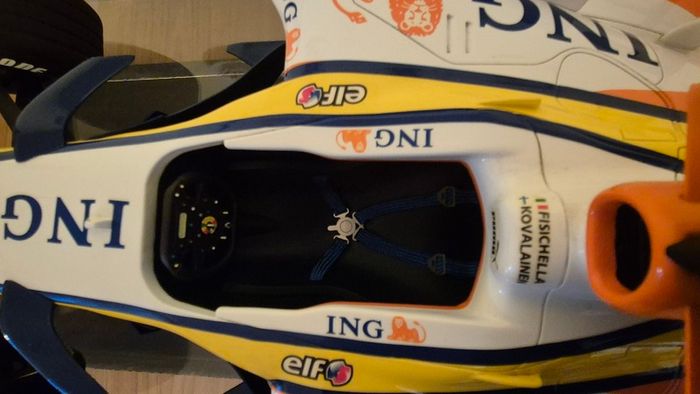 A 1:6 scale (32 inches long Formula 1 car) limited edition model of the 2007 Season ING Renault R27 F1 Team car