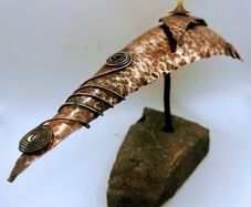 Handcrafted hammered copper sculpture
