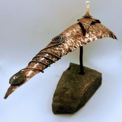 Handcrafted hammered copper sculpture