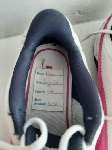 New pink white and navy junior puma trainers