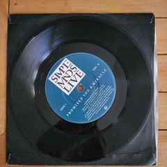 Simple Minds Live Promised You A Miracle 7 inch single