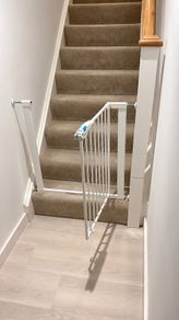 Adjustable baby safety gate and Vtech walker