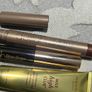 DELILIAH stay the night shadow stick in cinnamon swirl, brow gel, wander beauty mile high club volume and length mascara Image 3