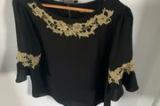 Oasis black /gold top