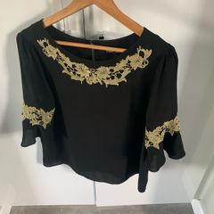 Oasis black /gold top