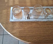 Candle holder display with candle extinguisher