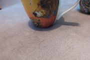 Two designer red Indian cups