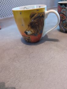 Two designer red Indian cups