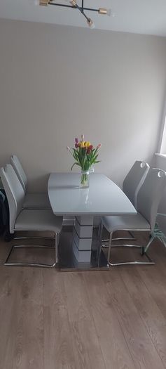 gray extending dining table and 4 chairs