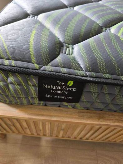 Super King mattress with wooden bed