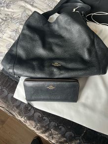 Coach pebbled leather bag and matching wallet.