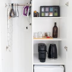 Hairdryer, Kettle, Iron, Iron Table, Nespresso vertuo pop, Mini fridge, glasswear. All what you see in the picture