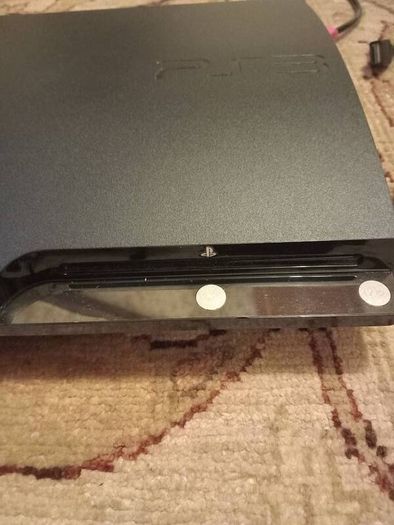 PS3 slim console, controller and games