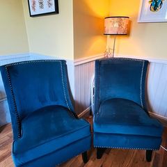 Two stunning navy wingback chairs