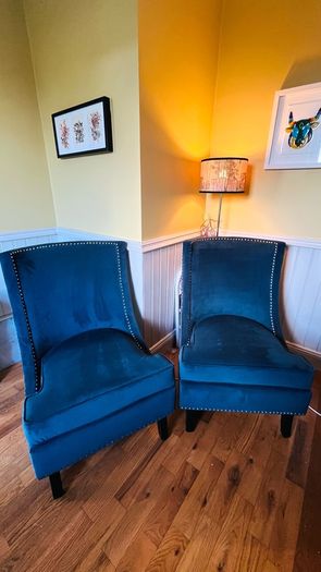 Two stunning navy wingback chairs