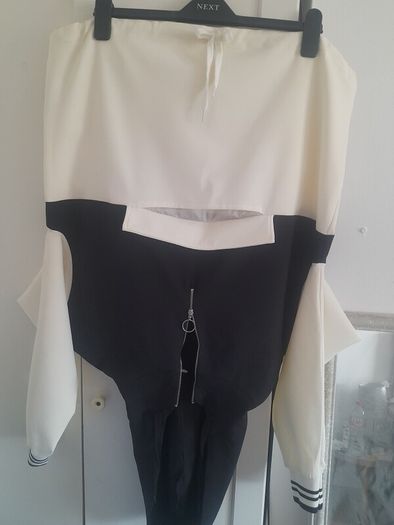 Ladies / Teens light hooded summer jacket with front pocket .