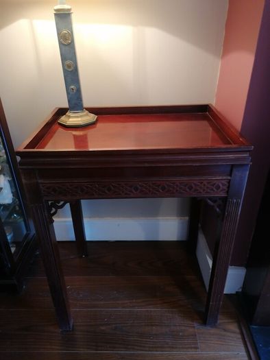 Elegant carved wooden dumb waiter table