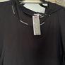 Naya black hooded top with white piping and design down back Image 2