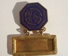 WORLD CONFEDERATION FOR PHYSICAL THERAPY (World Physiotherapy) - a vintage delegate's congress badge (1953)