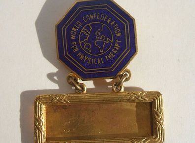 WORLD CONFEDERATION FOR PHYSICAL THERAPY (World Physiotherapy) - a vintage delegate's congress badge (1953)