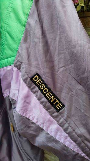 Vintage Descente 1980s ski jacket Official supplier of the Suisse ski team This is a rare and unique piece The quality and finish on the jacket is extremely high  It's in mint condition for its age Size medium
