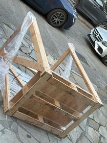Wooden palette enclosed on 3 sides