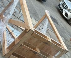 Wooden palette enclosed on 3 sides