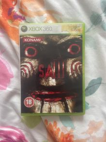 Saw Xbox 360 complete with manual