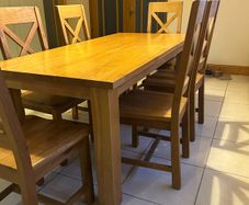 Solid oak dining table with 6 chairs