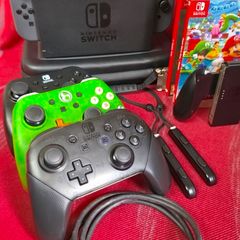 Nintendo Switch (adult own) Multiplayer Bundle - 4 Controllers + Mario Wonder & It Takes Two