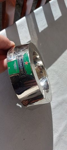 Heineken metal ashtray ,used condition, still nice condition ,buyer collects or pays postage thank you, sold as is,
