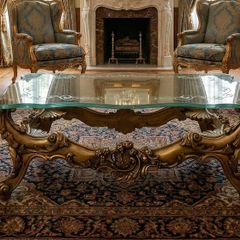 Very nice glass topped coffee table.