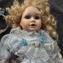 Vintage Irish Porcelain Doll with Flower Wreath and Pinwheel Vintage Image 3